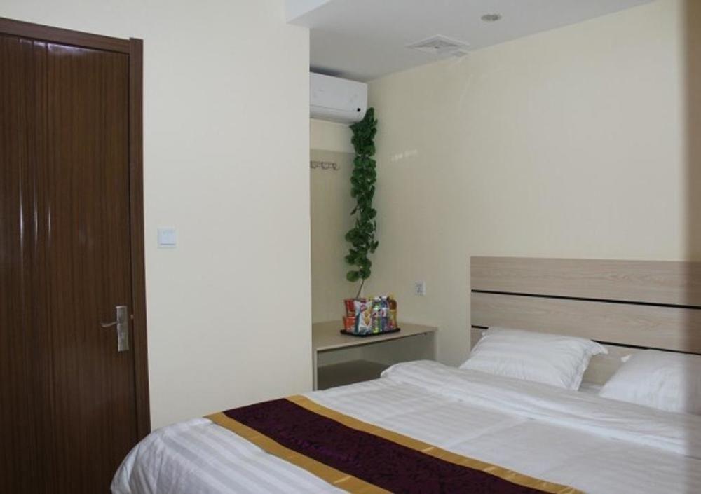 Dalian Kai Bin Business Inn Extérieur photo