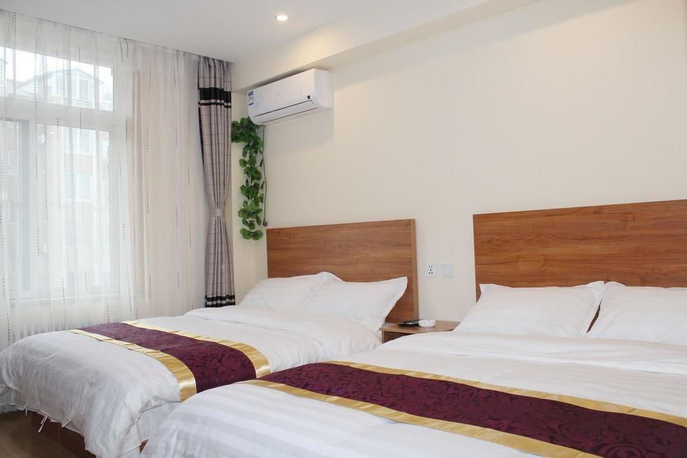 Dalian Kai Bin Business Inn Extérieur photo