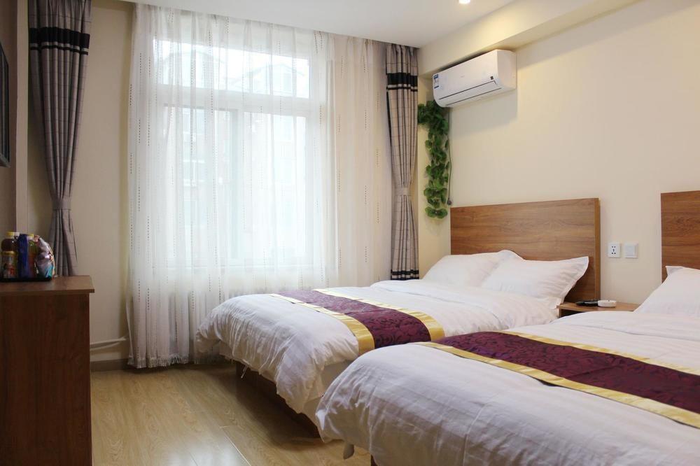 Dalian Kai Bin Business Inn Extérieur photo