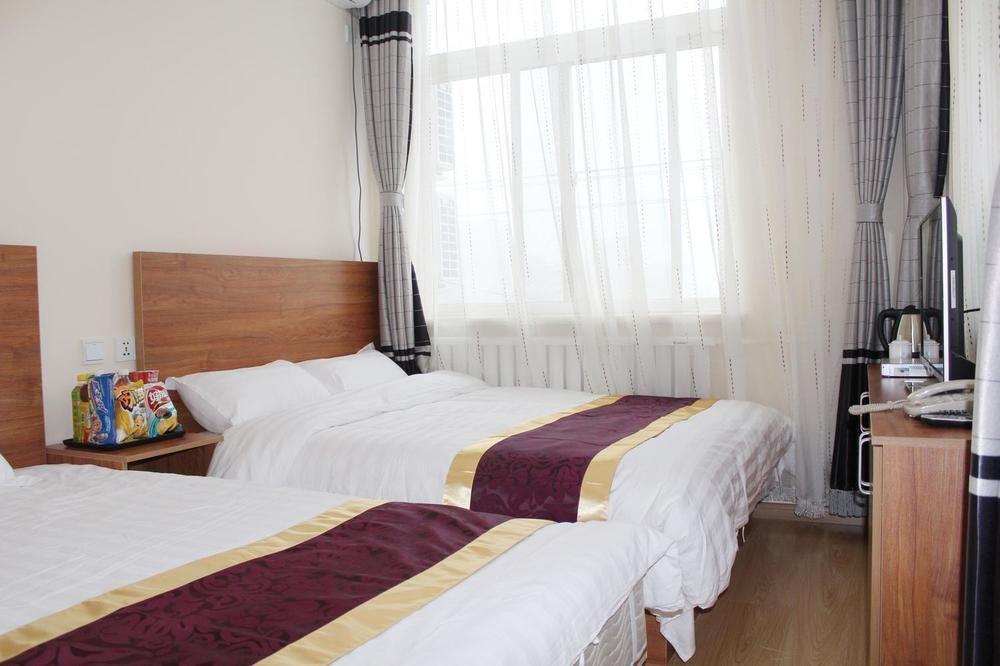 Dalian Kai Bin Business Inn Extérieur photo