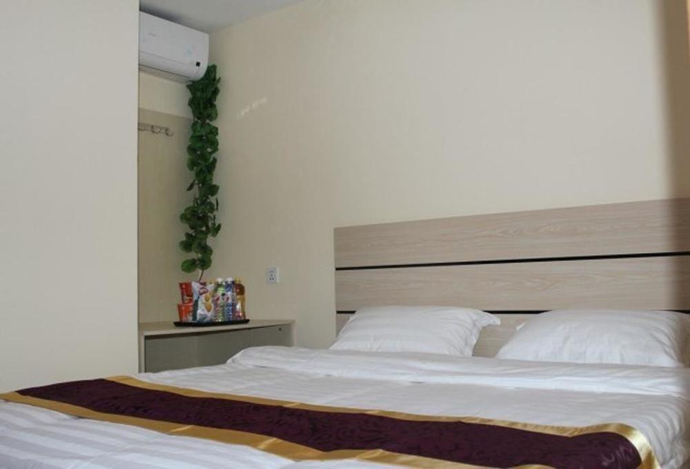 Dalian Kai Bin Business Inn Extérieur photo