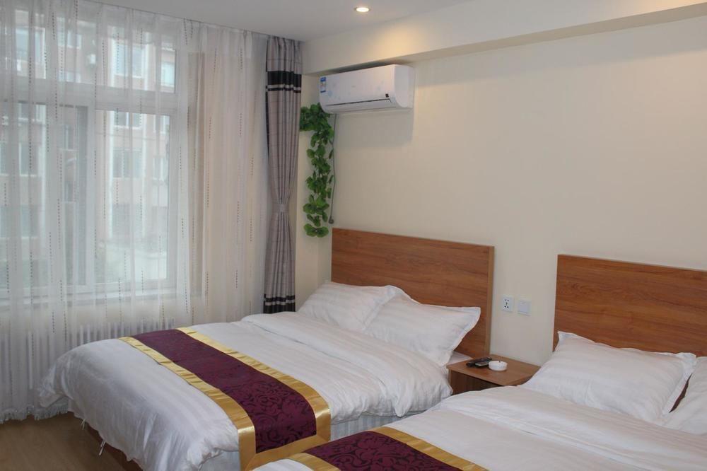 Dalian Kai Bin Business Inn Extérieur photo