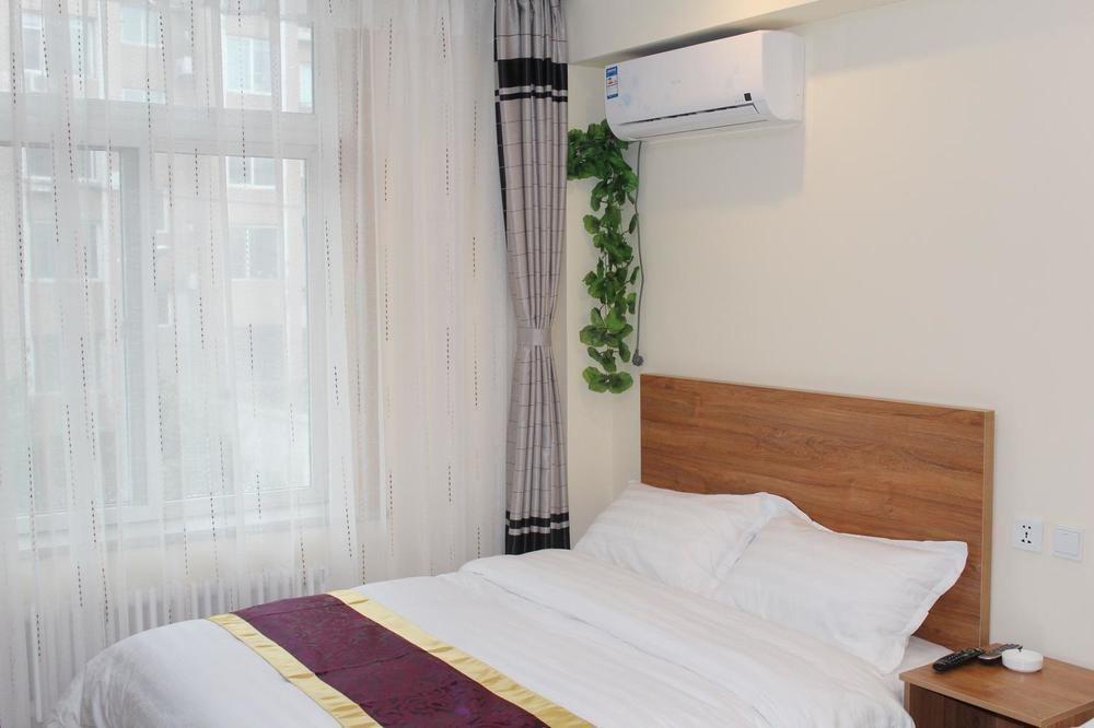 Dalian Kai Bin Business Inn Extérieur photo